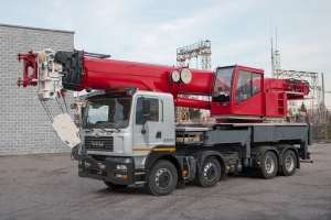 50 tons load carrying capacity crane truck based on the KrAZ-7133Н4 chassis appeared in the range of similar KrAZ special equipment