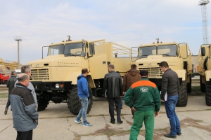 Foreign Customer Inspects a Batch of KrAZ Trucks Ready for Shipment